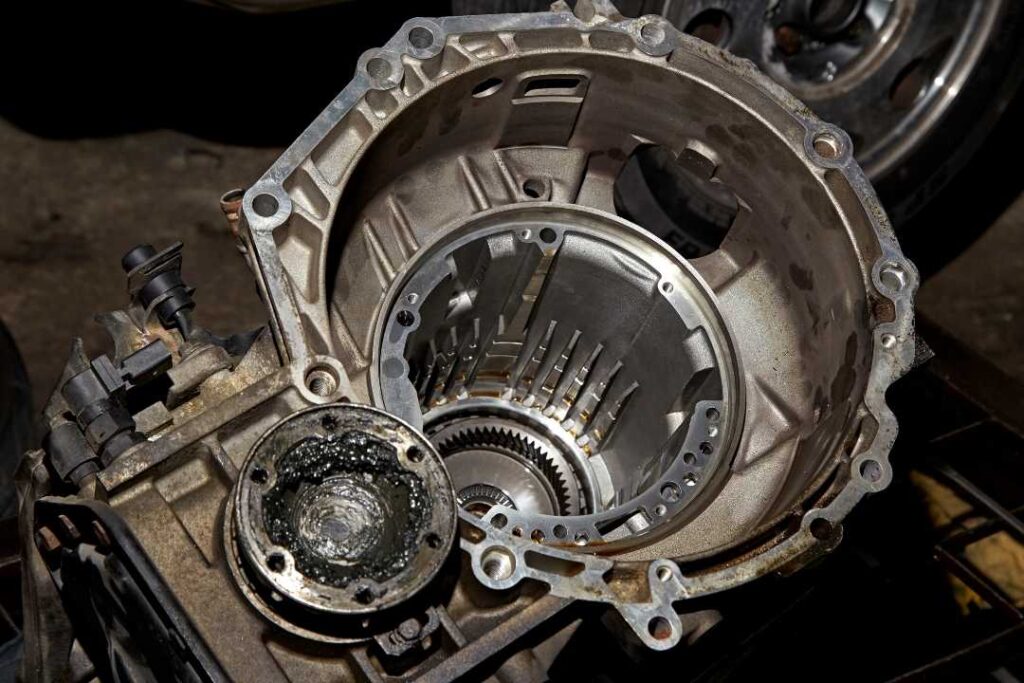Open transmission housing during a transmission rebuild service