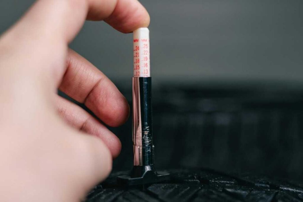 Measuring tire tread depth during a tire inspection